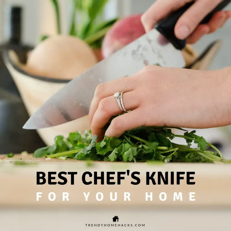 the hands of someone holding a chef's knife and cutting fresh parsley on a cutting board and with 'The Best Chef's Knife for you Home' written text