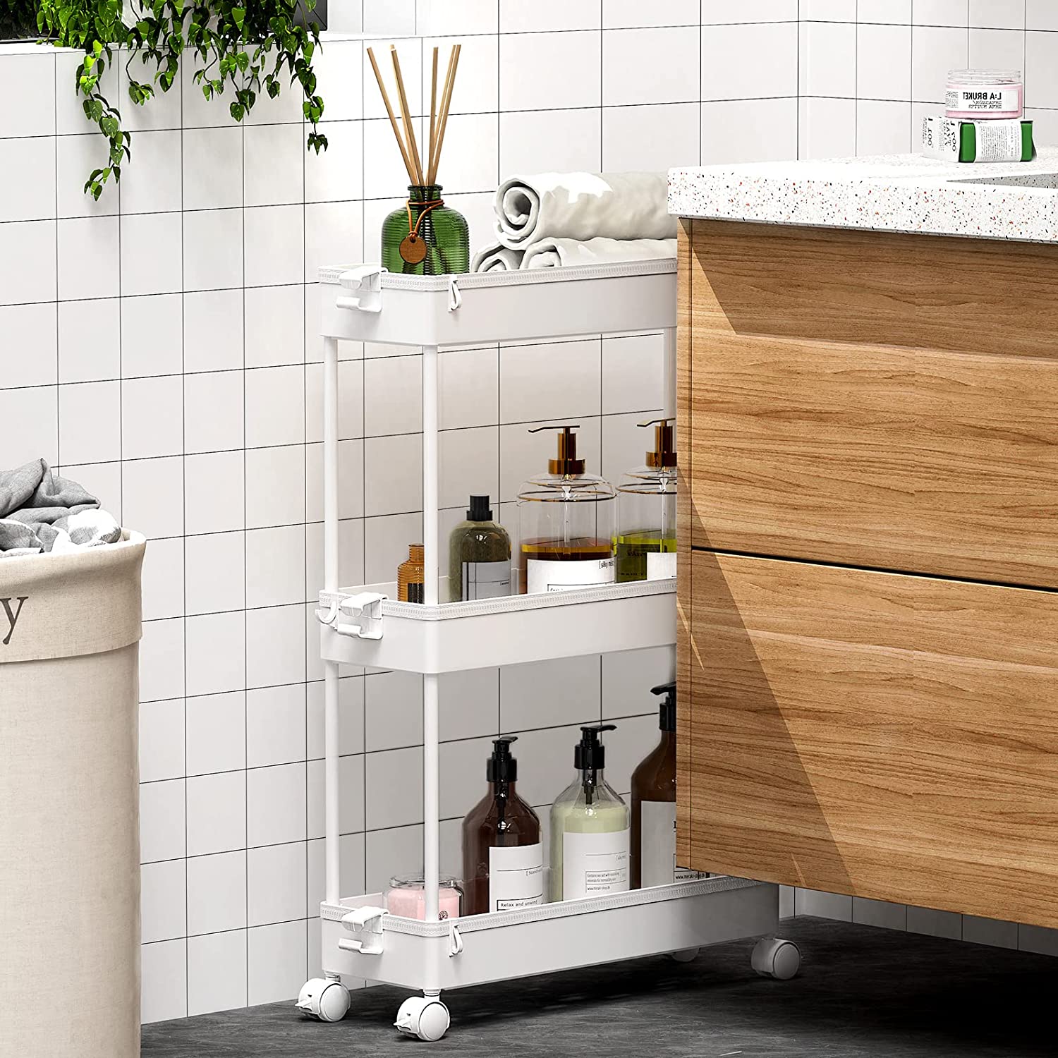 a rolling cart is a great way to provide storage solution to a small bathroom and also a very practical idea to move things around easily