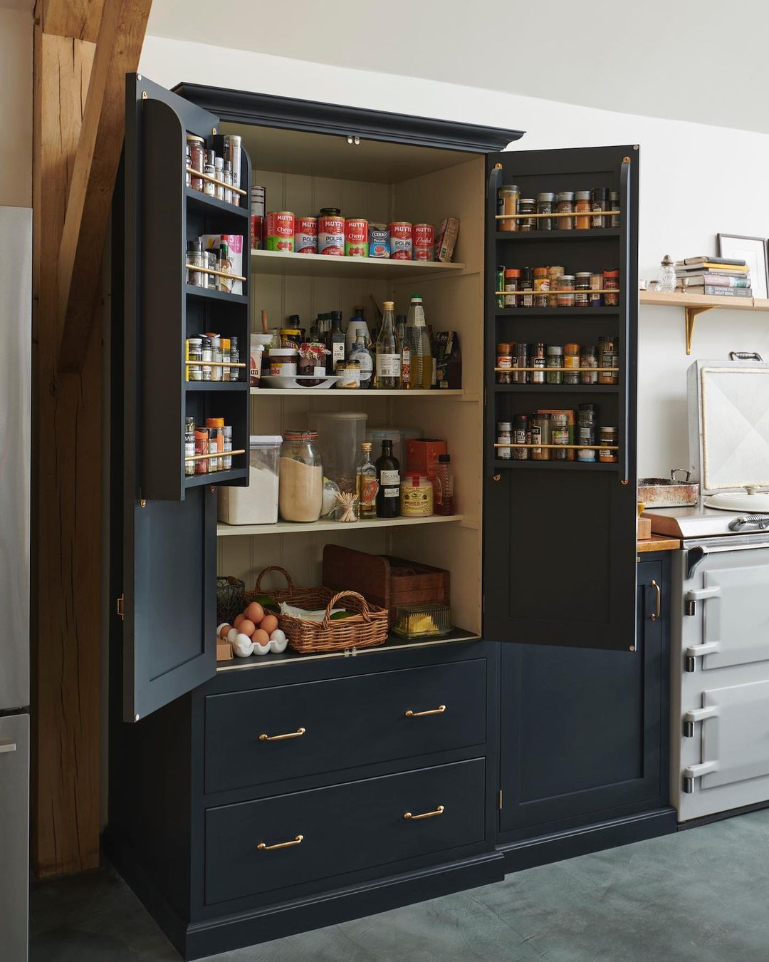 A kitchen with a spacious pantry is essential for keeping things organized.