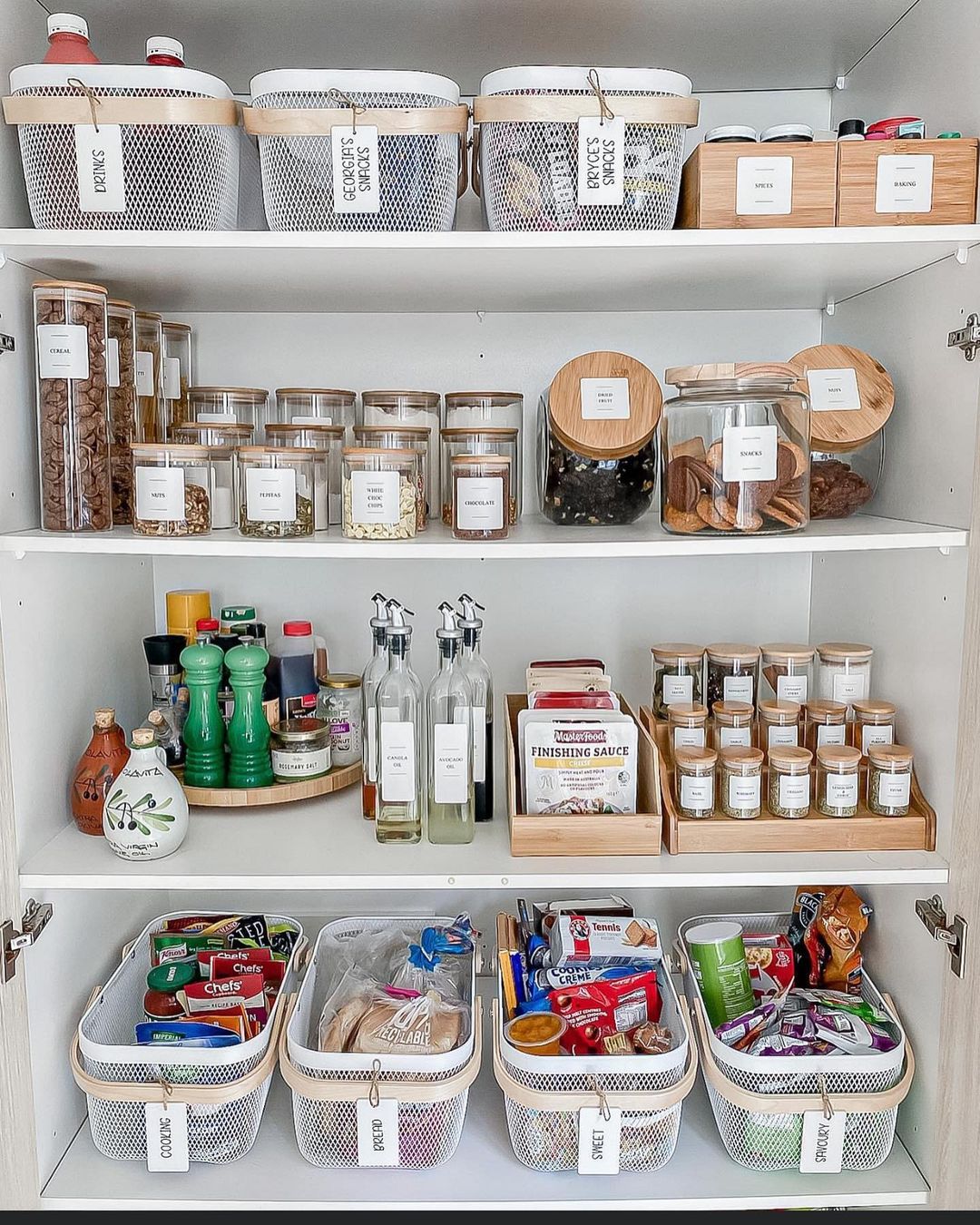 A pantry filled with food and beverages, organized and stocked.