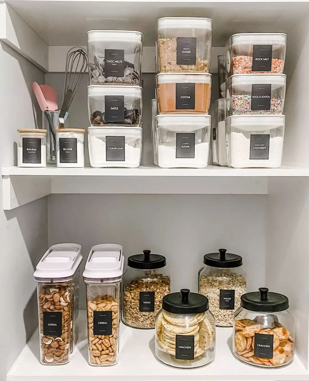 Organize your pantry with a variety of containers and jars for better efficiency.