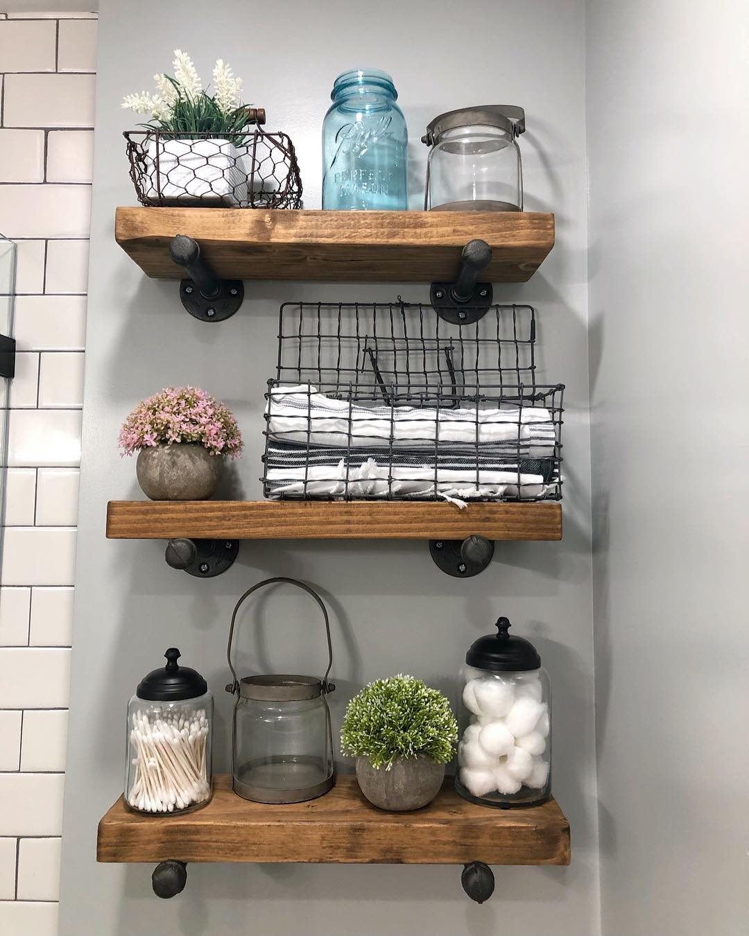 bathroom floating shelves with wire baskets