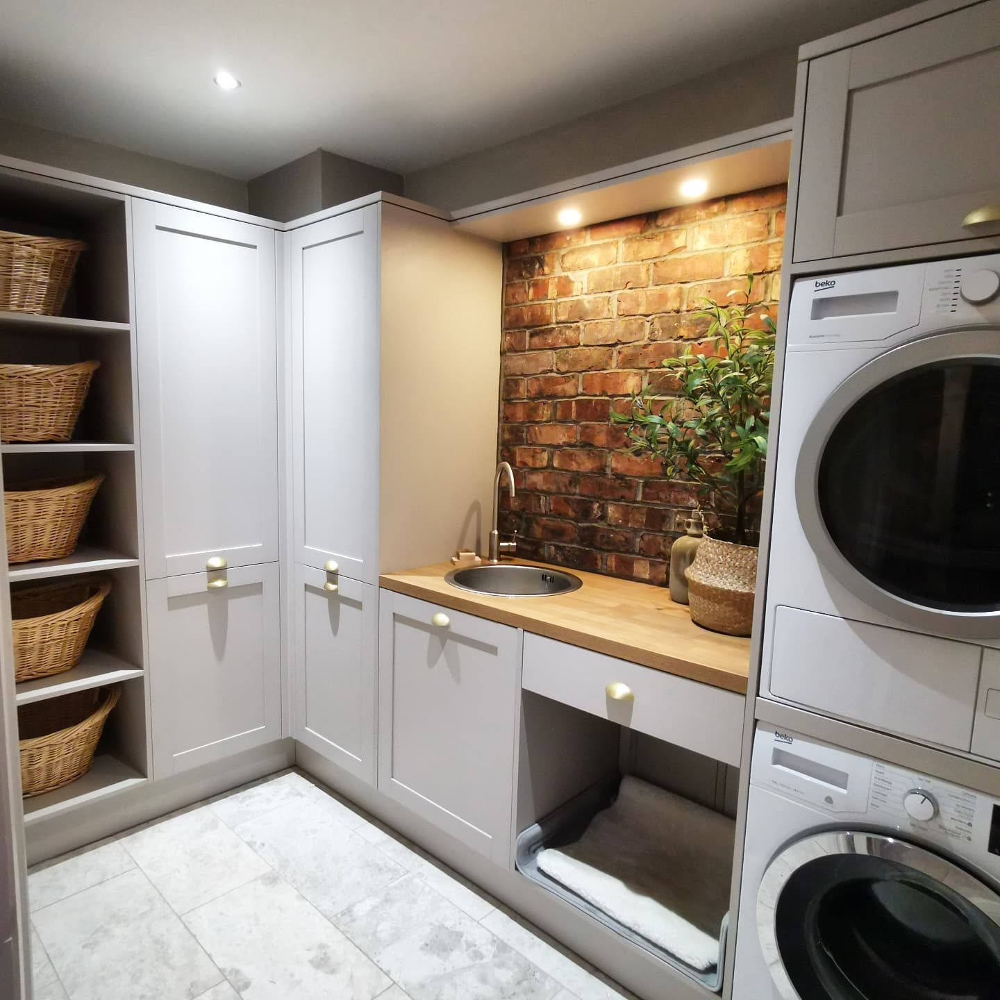 To Maximize Space in Your Long Narrow Laundry Room start by decluttering and add clever storage options wherever possible to utilize any unused spaces.