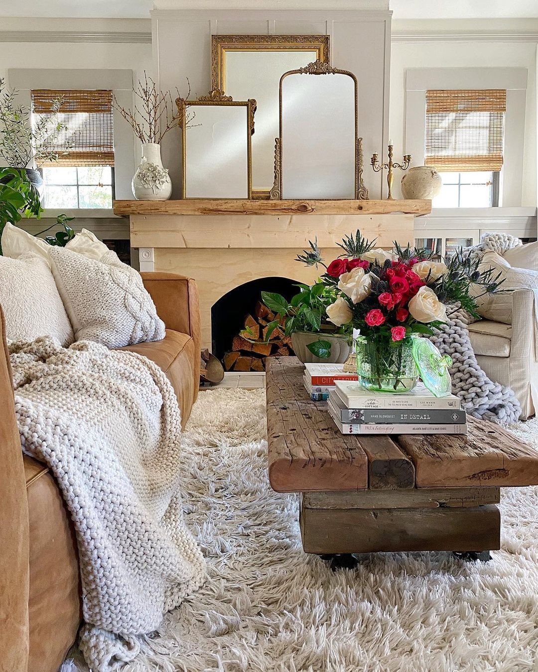 throw blankets, throw pillows, plush area rug make for a cozy winter decor while using textiles to add textures to a living space