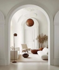 interior of a minimalist living space with a neutral color palette and minimalist furniture