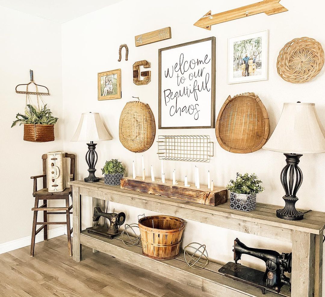 wall decor using various items and decor accents and a console table styled with rustic elements