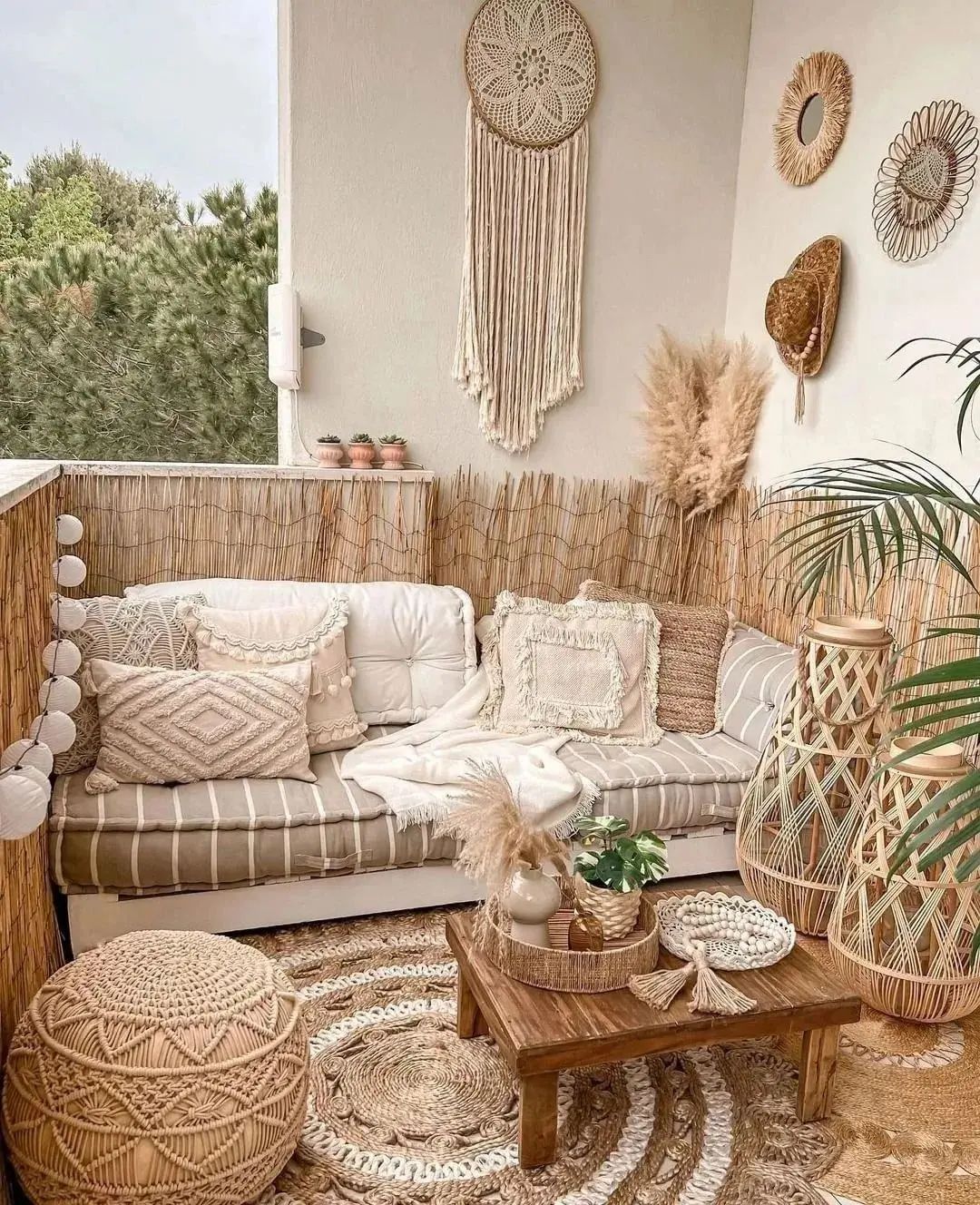 outdoor space such as this balcony can be styled with bohemian textures include an area rug to bring character and coziness to the outdoor space