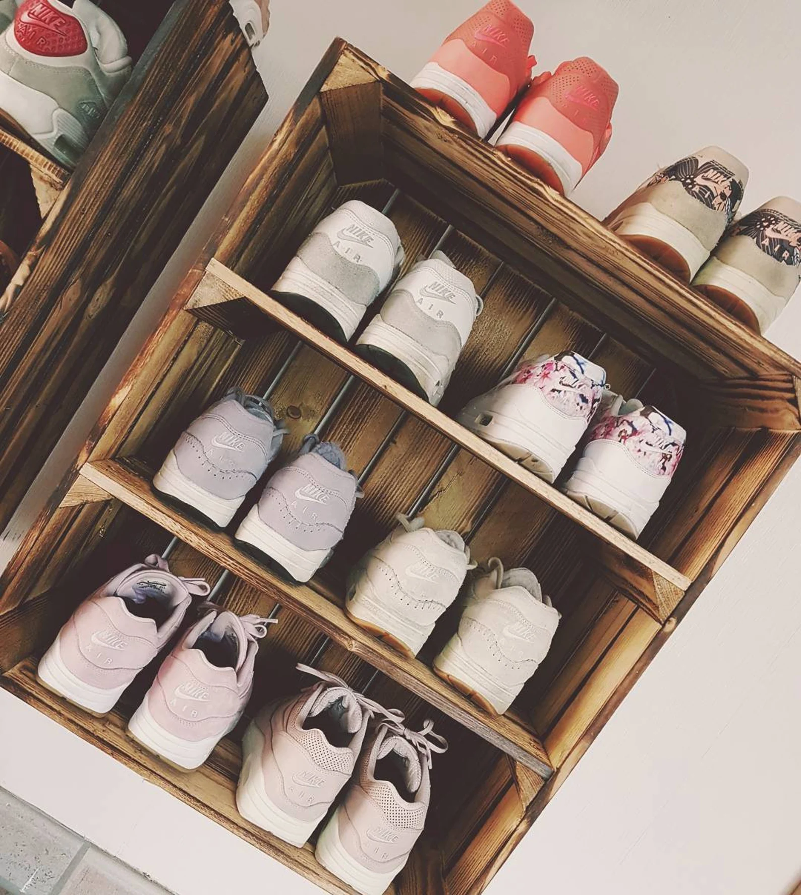 Using stackable fruit boxes to organize shoes is a versatile and clever organization solution for the home.