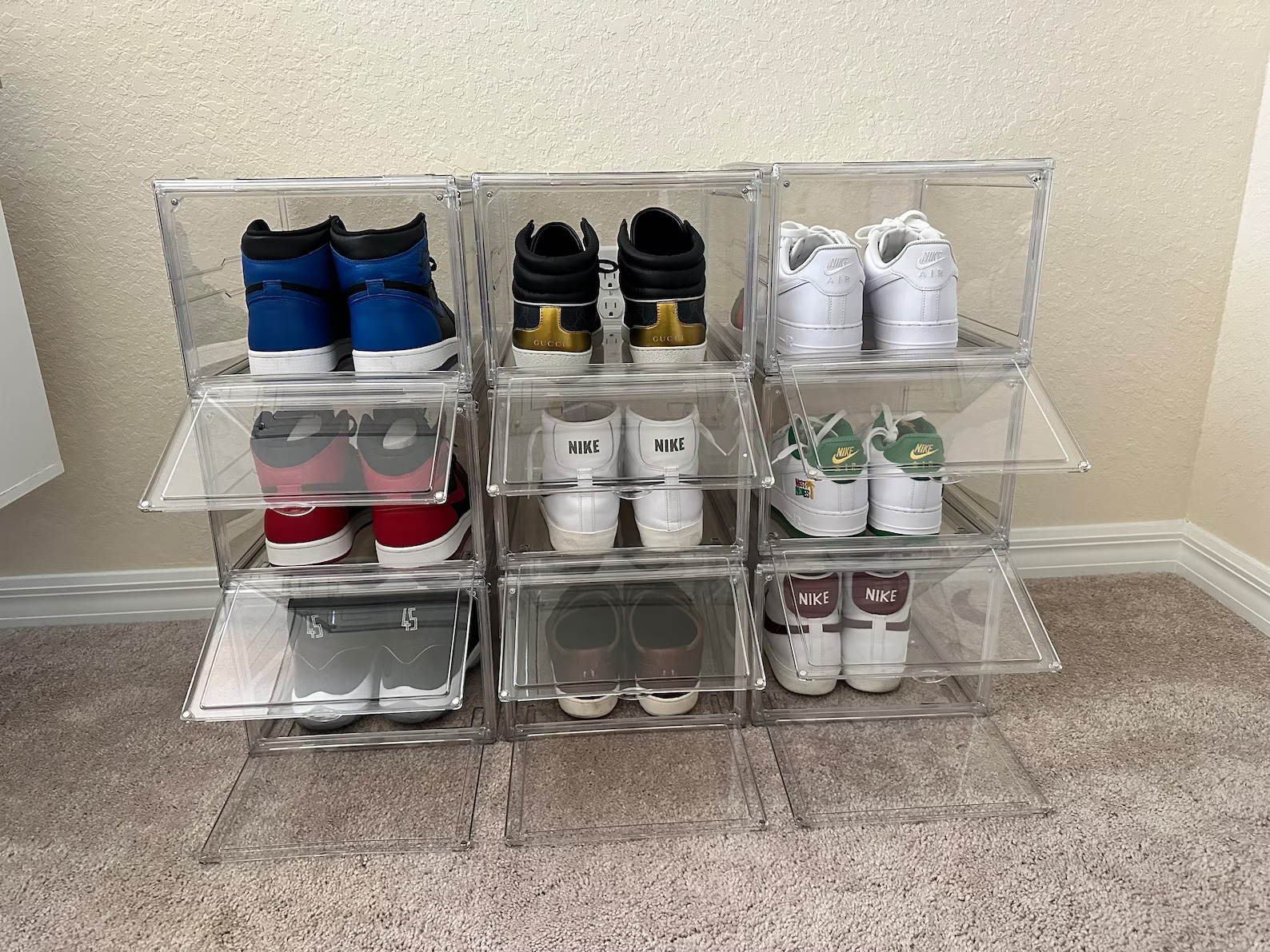Clear plastic shoe storage box with magnetic doors are functional, space-saving, and act as a modern decor feature to organizing shoes. 
