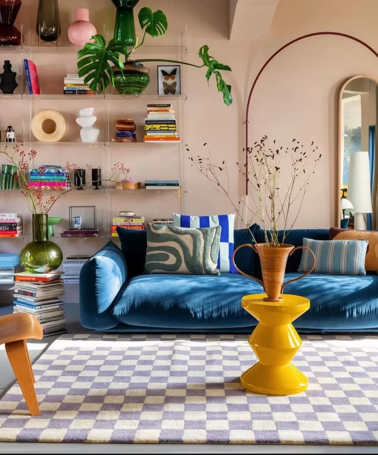 a blue couch or a bright yellow centre table are ways to introduce a pop of color to an interior as in this funky living room.