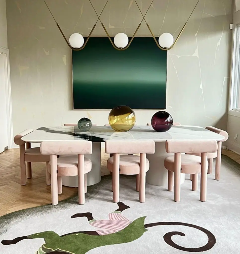 a custom rug is a great way to anchor the design in this funky dining room.