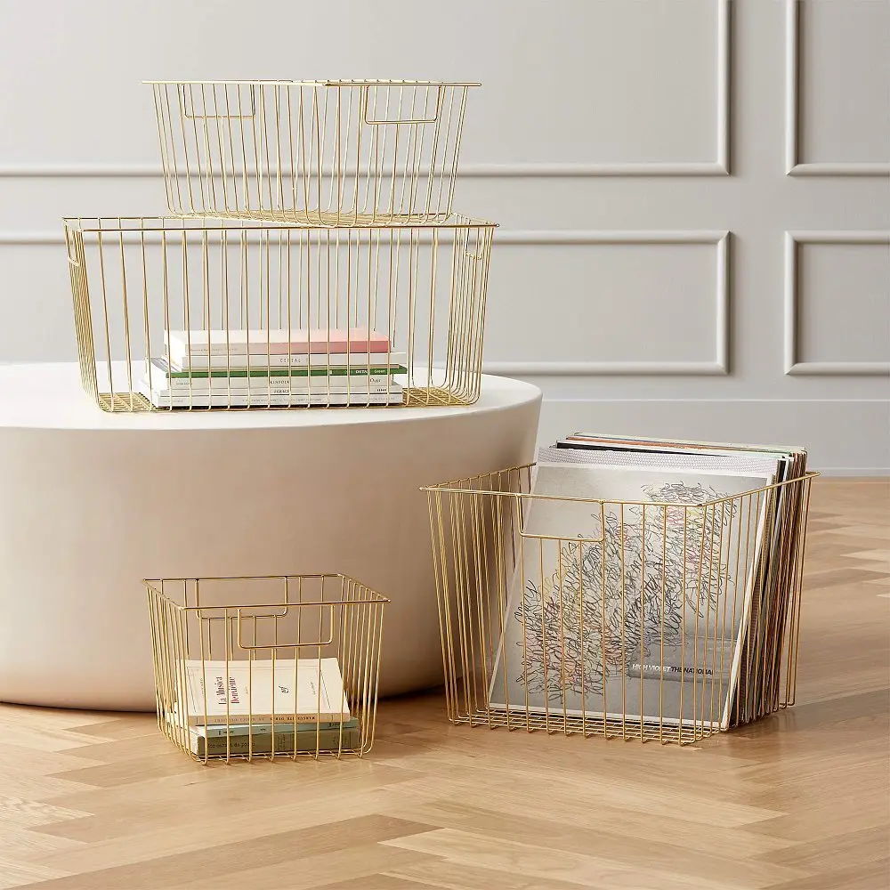 gold wire basket comes in different sizes providing ample bedroom organization options.