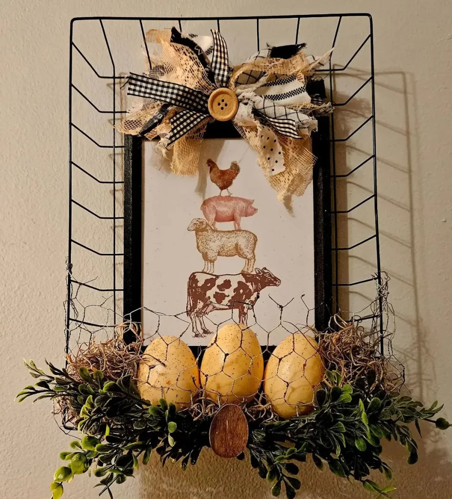 wire baskets are popularly used in farmhouse home decor as in this wall decor piece that includes eggs and a farmhouse-inspired sign.