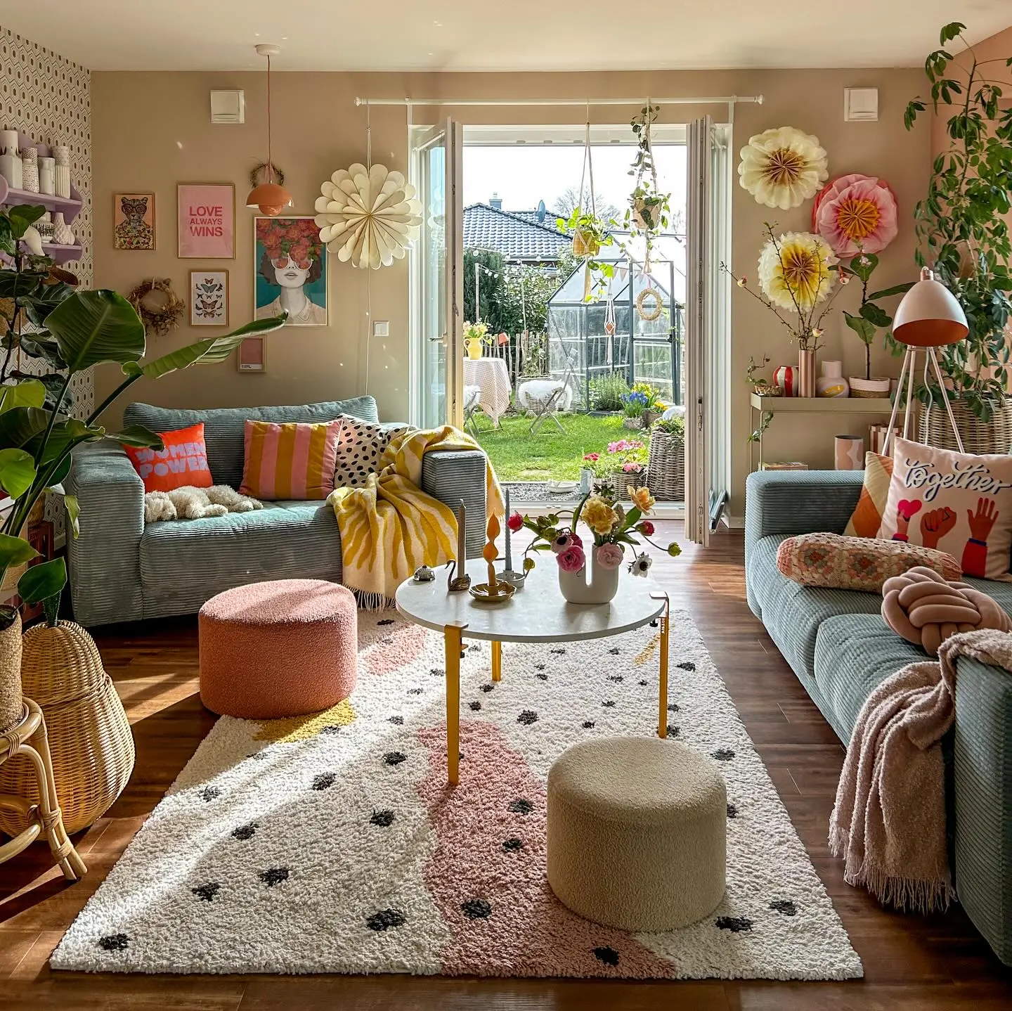 a living room with colorful decor including a mix of patterns in pillows, throws, and floor rugs as well as seatings done well can bring the personality and funky style to an interior.