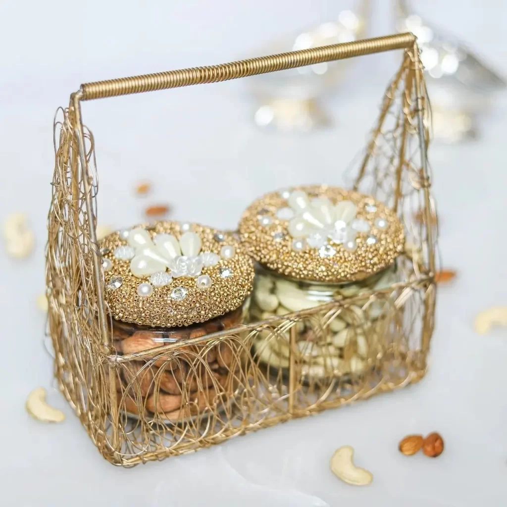 wire baskets come in different colors such as gold and provides the perfect storage option for food like cookies and boxes of different nuts.