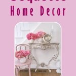 Looking to create a romantic and elegant home? Discover Coquette Home Decor. Featuring a white ornate table with pink flowers, decorative items including a clock and books, complemented by a white chair holding a pink flower basket—your perfect touch of charm.