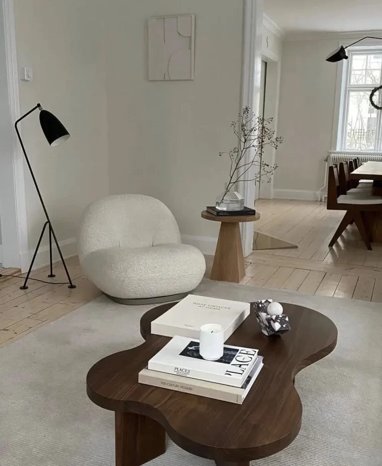 a minimalist side table can easily transform your small living spaces when paired with other decor items such as a minimalist sofa and floor light.