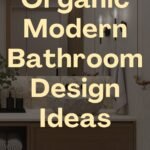 Pinterest pin with text overlay that reads "Organic Modern Bathroom Design Ideas" above an elegant Organic Modern Bathroom featuring a wooden vanity, stone wall, plush towels, and wall-mounted lights.