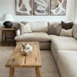 natural materials like wood and neutral colors along with curvy lines make this living room serene and reminiscent of organic modern interior style