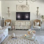 vintage living room furniture such as these chair and chest of drawers add to the french country feel of this space seamlessly