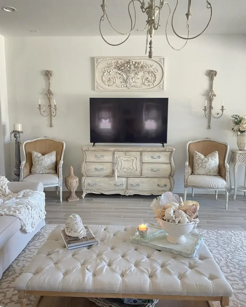 vintage living room furniture such as these chair and chest of drawers add to the french country feel of this space seamlessly