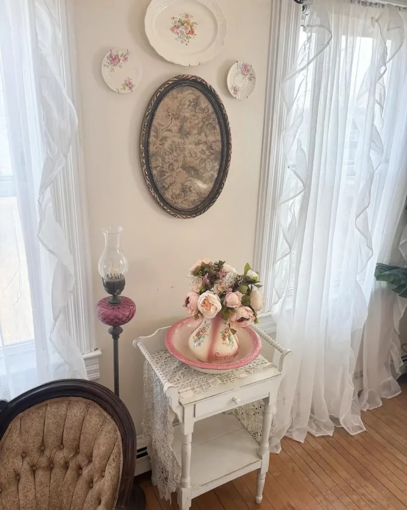for a vintage feel this french-coquette-styled bedroom incorporate antique dining-wares as wall art bringing nostalgia and beauty to the space