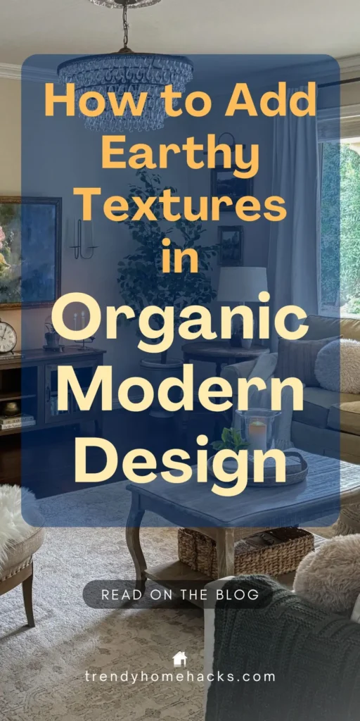 Living room decorated in organic modern style with a mix of earthy textures including a woven basket, wood coffee table, plush rug, and cozy textiles. Overlay text reads “How to Add Earthy Textures in Organic Modern Design.”
