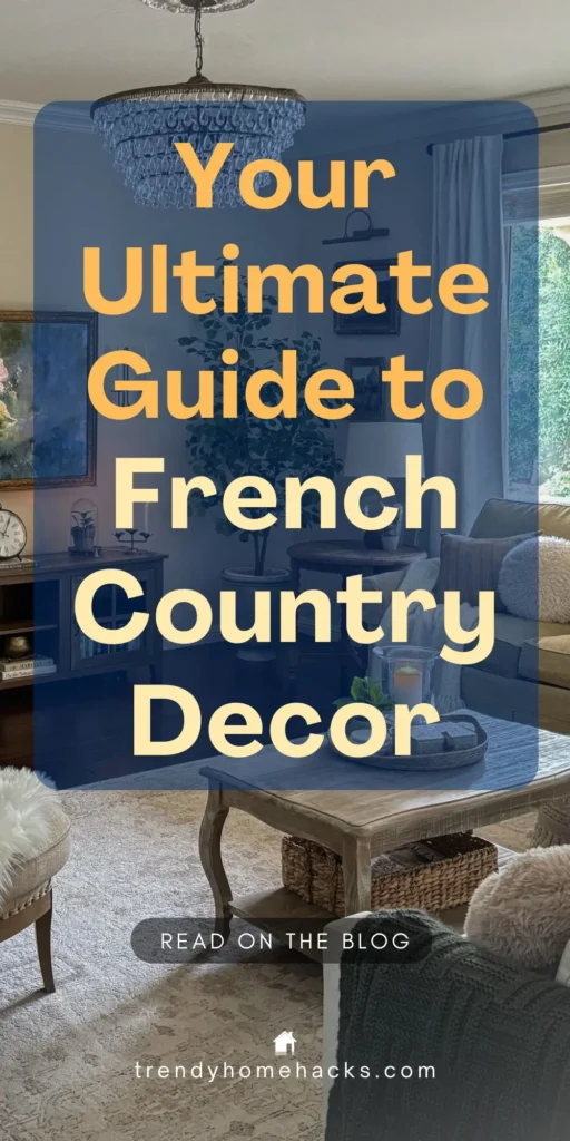 A warm, inviting living room styled in French country decor, featuring a rustic wooden coffee table, wicker baskets, a crystal chandelier, and neutral-toned seating with soft throw pillows. Text on image reads: “Your Ultimate Guide to French Country Decor.”