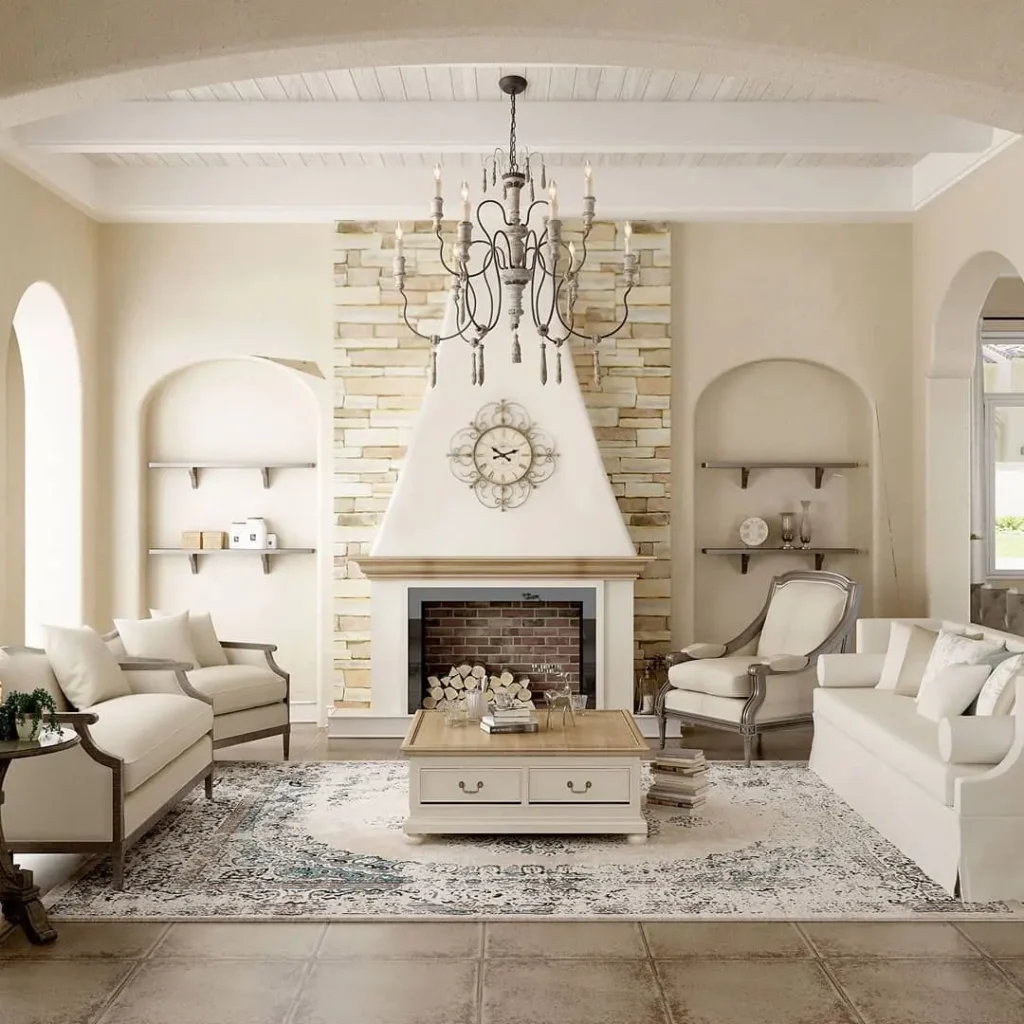 Elegant living room with a white sofa set, wooden coffee table, decorative fireplace, wall clock, featuring French country chandelier, and built-in shelves, all in soothing neutral tones.