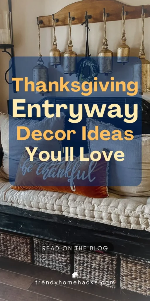 Thanksgiving-themed entryway with a black bench, textured cream cushion, fall pillows including one that says “be thankful,” and woven baskets underneath. Rustic brass bells hang on a wooden wall hook. Text overlay reads “Thanksgiving Entryway Decor Ideas You'll Love.”