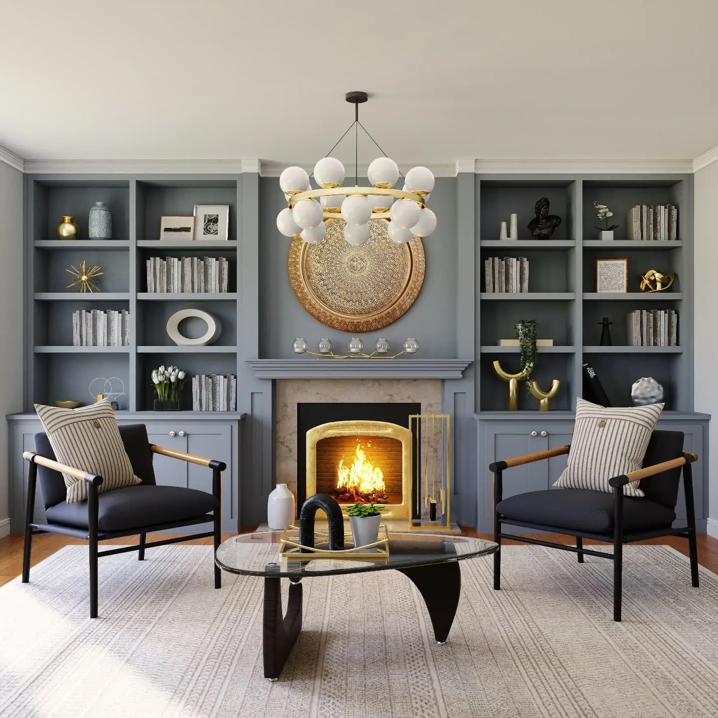 Stylish mid-century modern living room with blue built-in shelves, gold accents, and a round chandelier, featuring sleek armchairs and a glass coffee table around a cozy fireplace.